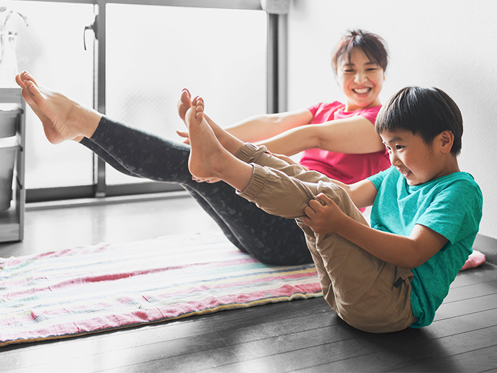 Mother and son stretching