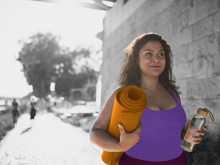 Lady with yoga mat