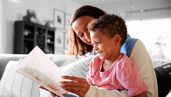 mom reading to son